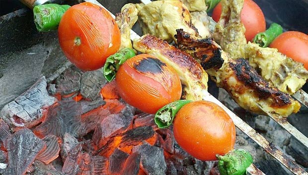 Jujeh kabab is one of the most famous Persian dishes. It consists of pieces of chicken first marinated in minced onion and lemon juice with saffron then grilled over a fire. It is sometimes served with grilled tomato and pepper. (Source: Wikipedia) 